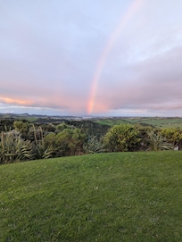 View from front lawn. Rainbow not always there. Haha.