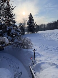 Another view from the condo looking down the ski out trail to the Disciples 8 lift.