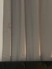 I hope that is a chocolate handprint and not blood. They cannot NOT see this when the come to make the bed.