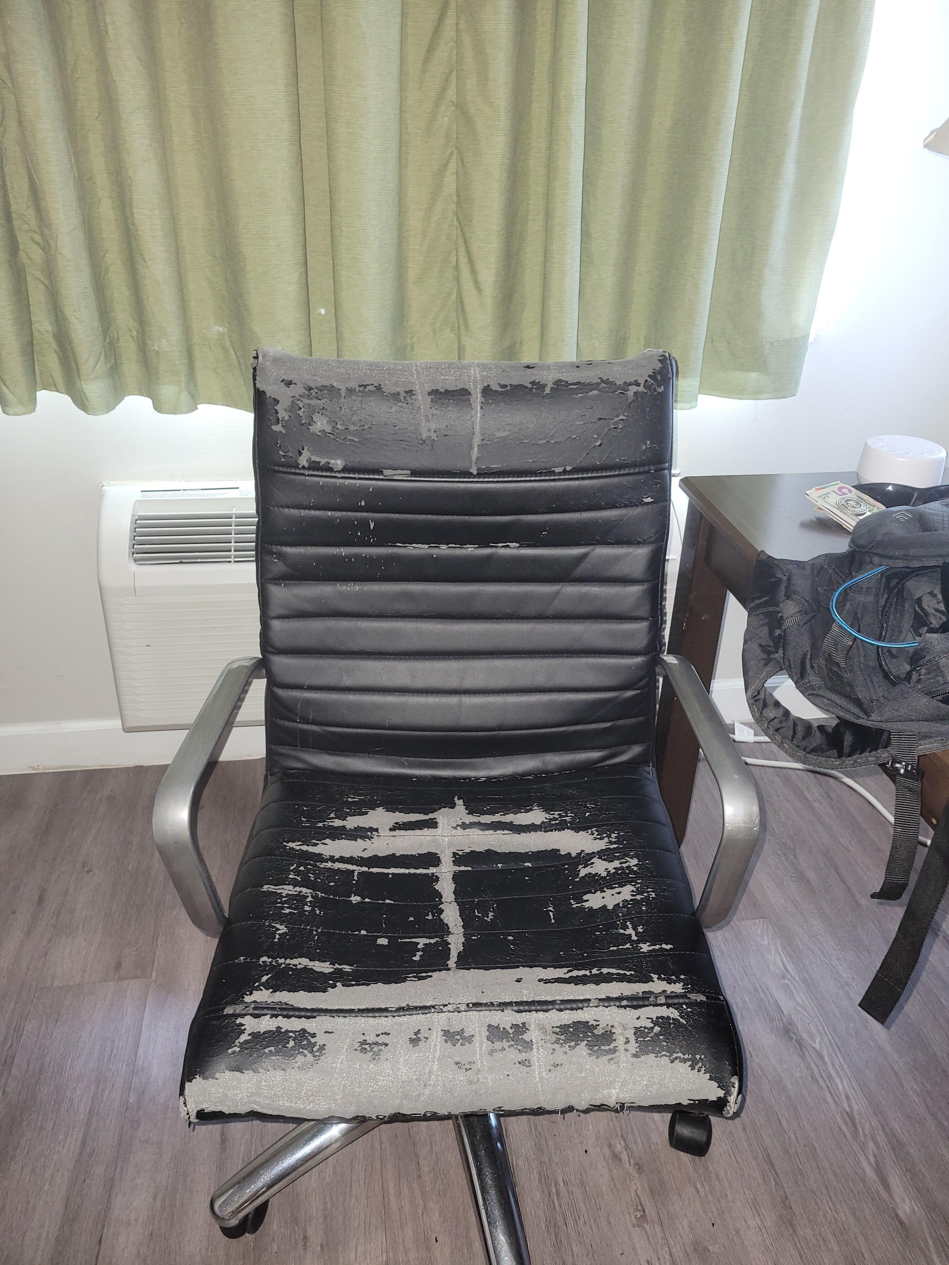 "Well-loved" office chair that left specks of black "pleather" on your clothes after sitting in it.