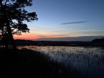 Sunset from the Marsh Retreat Back Deck
