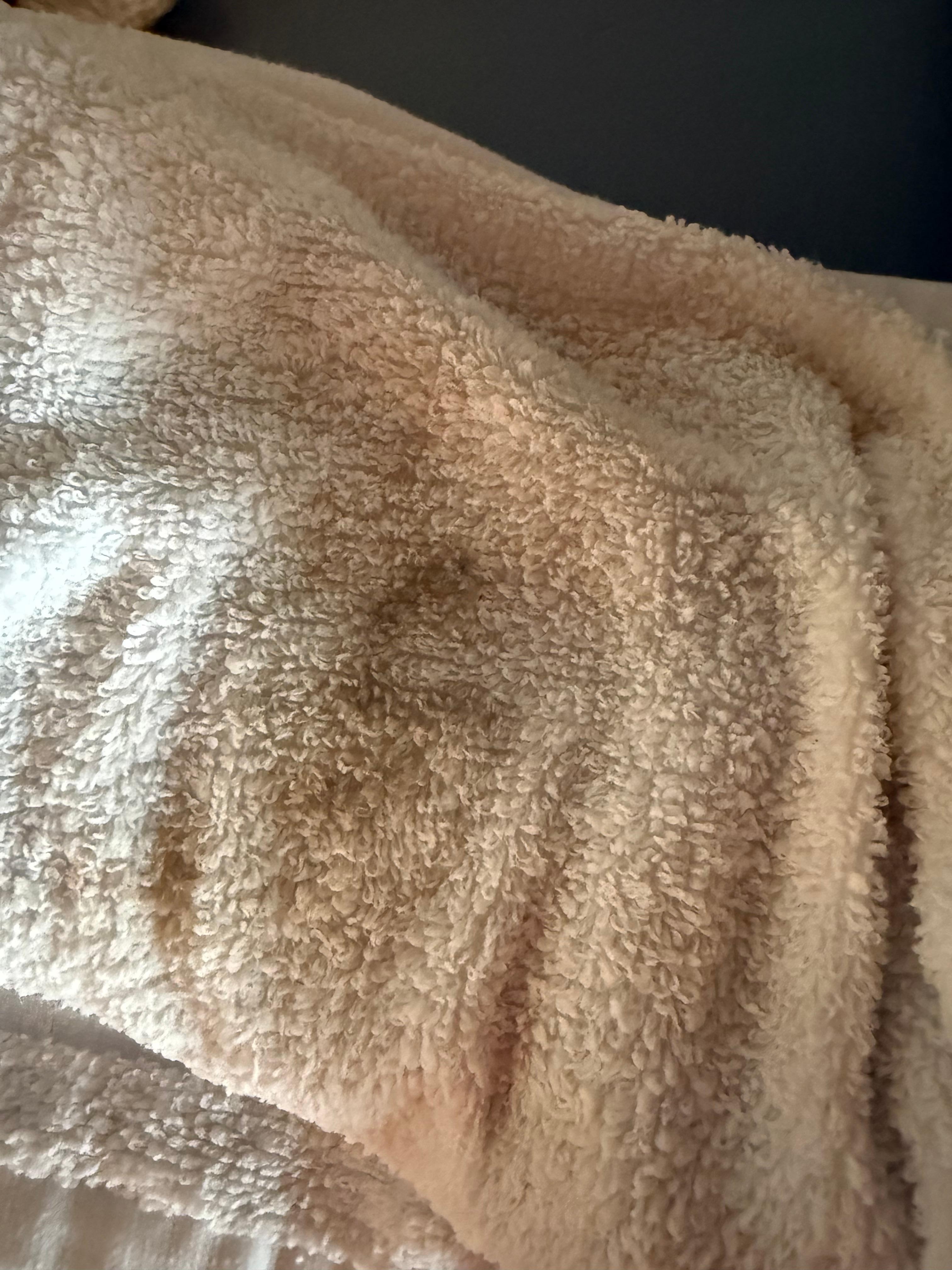 Dirt/dust from shelf in master bathroom 
