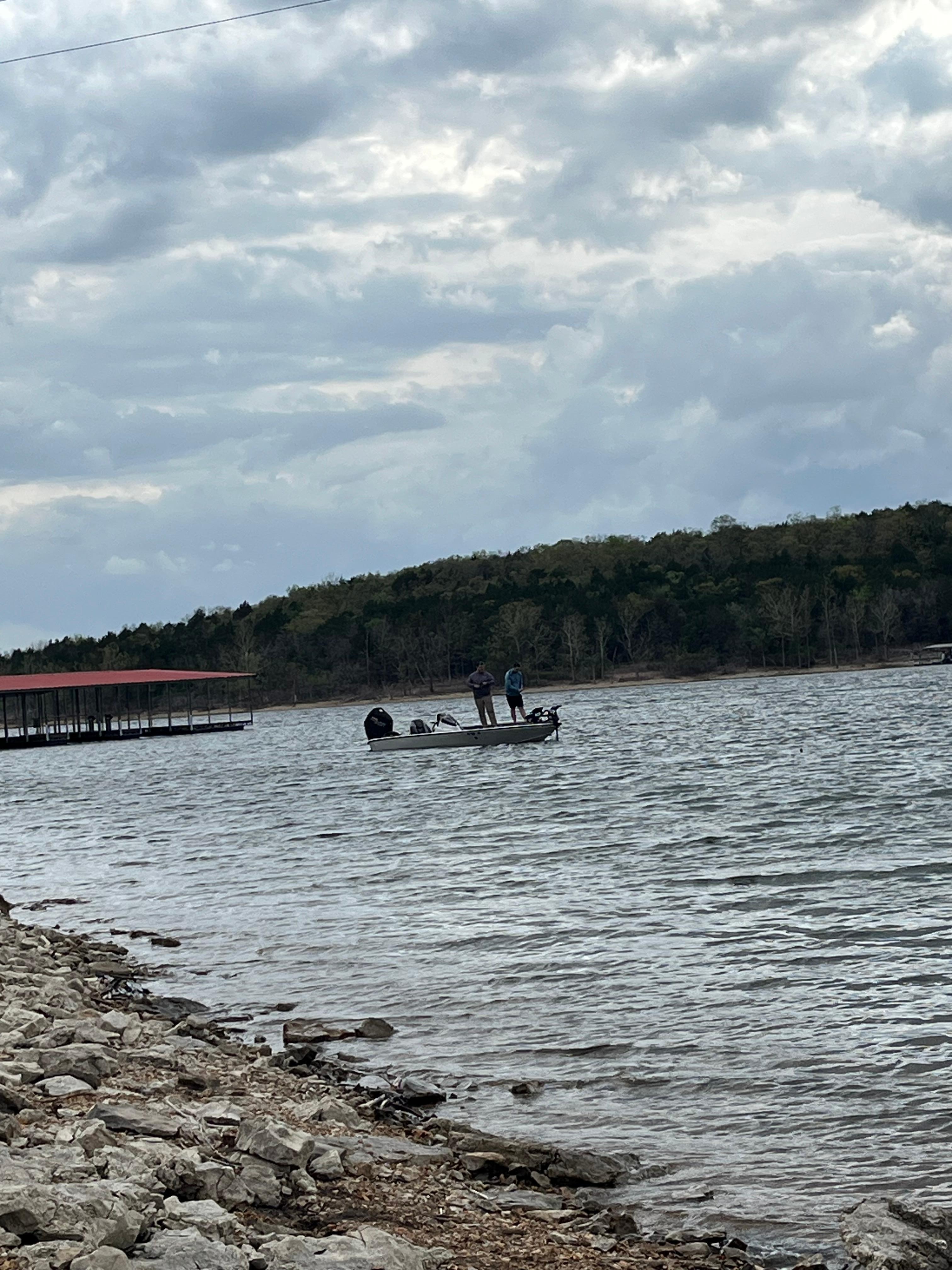 Sitting by lake watching these guys fish