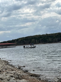 Sitting by lake watching these guys fish