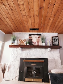 Adorable fireplace and farmhouse decor