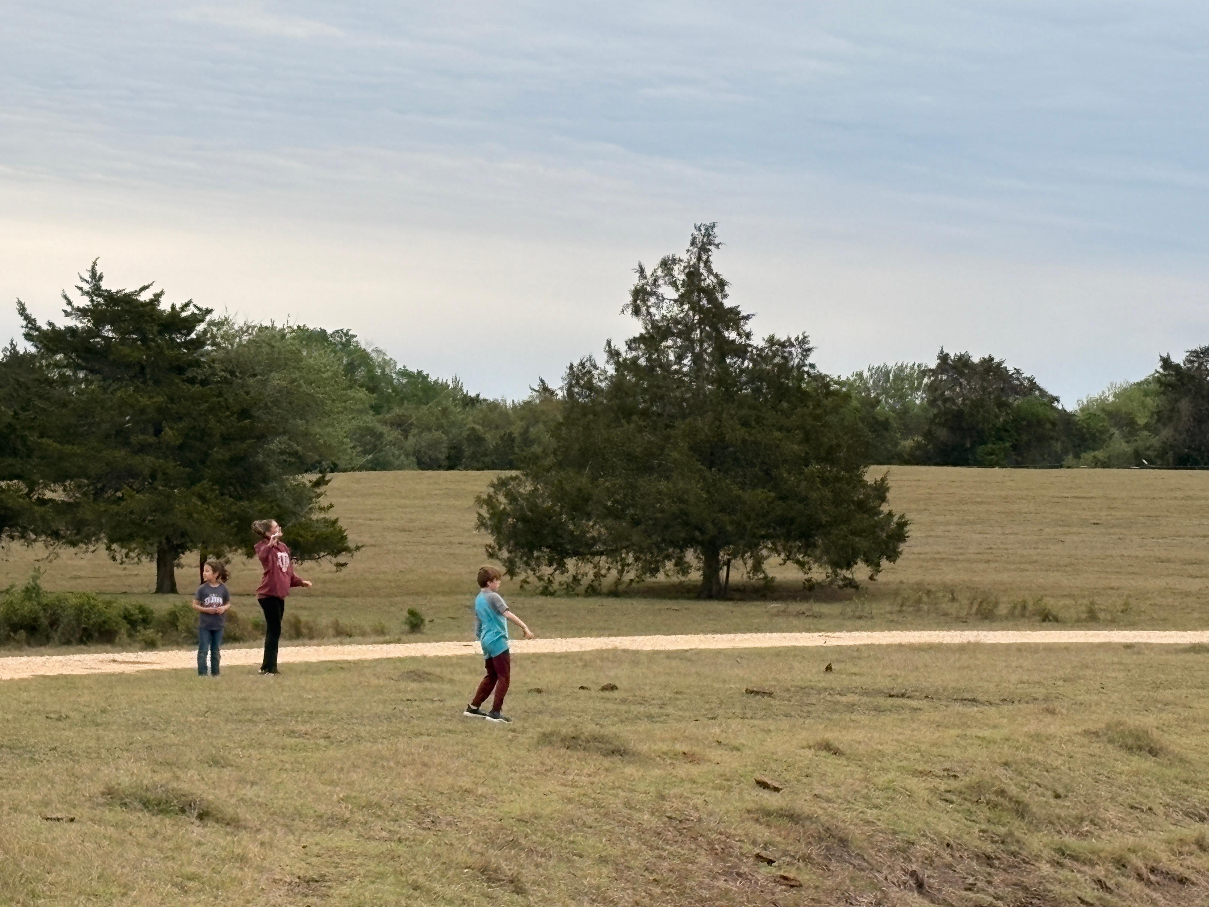 Flying kites by the tank 