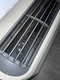 Rusted and moldy AC Unit