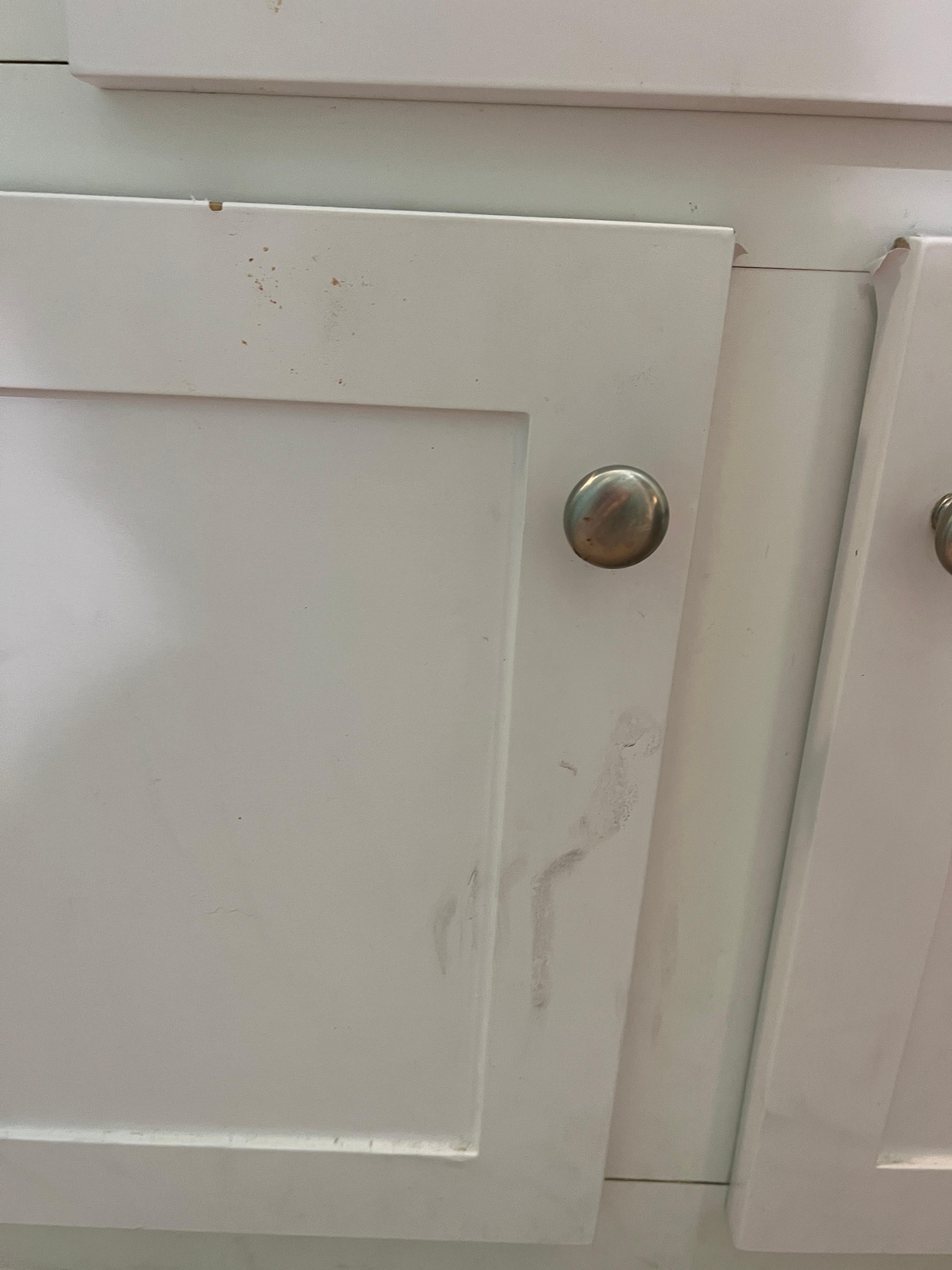 Dirt on all the walls and cabinets 