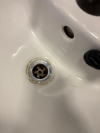 Bathroom in the room was dirty and grubby.