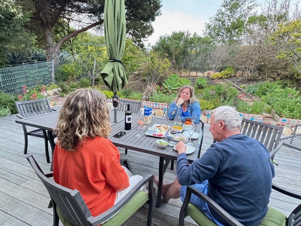 Appetizers on the deck among the plants and flowers