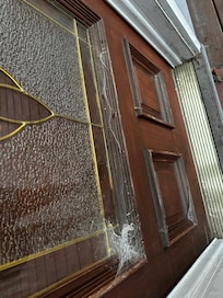 The welcoming front door if you can get past the overhead spider