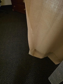 Curtains falling apart. Pull cords didn't work.