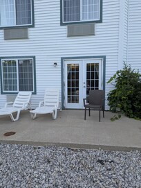 The rocks are only around the edge of the patio/building.