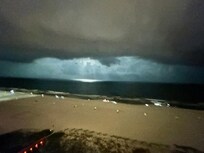 Watching a storm pass by was calming.