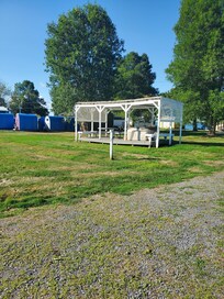 Gazebo with picnic table & other seating. Spa. Not sure if works due to emptiness.