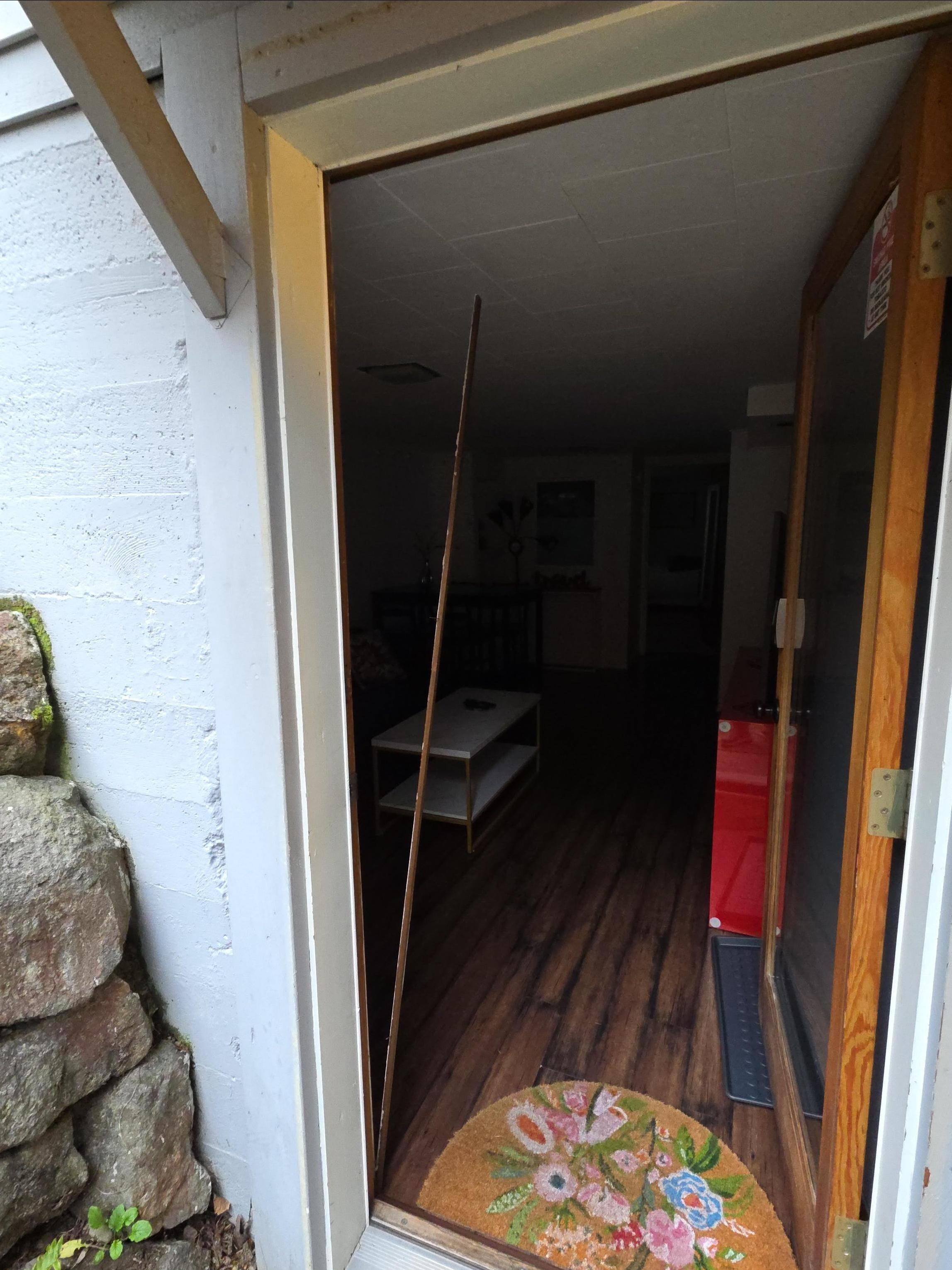 This is part of the door frame that broke off while closing the door. They didn't try to move it. There were nails sticking through. Big safety issue!