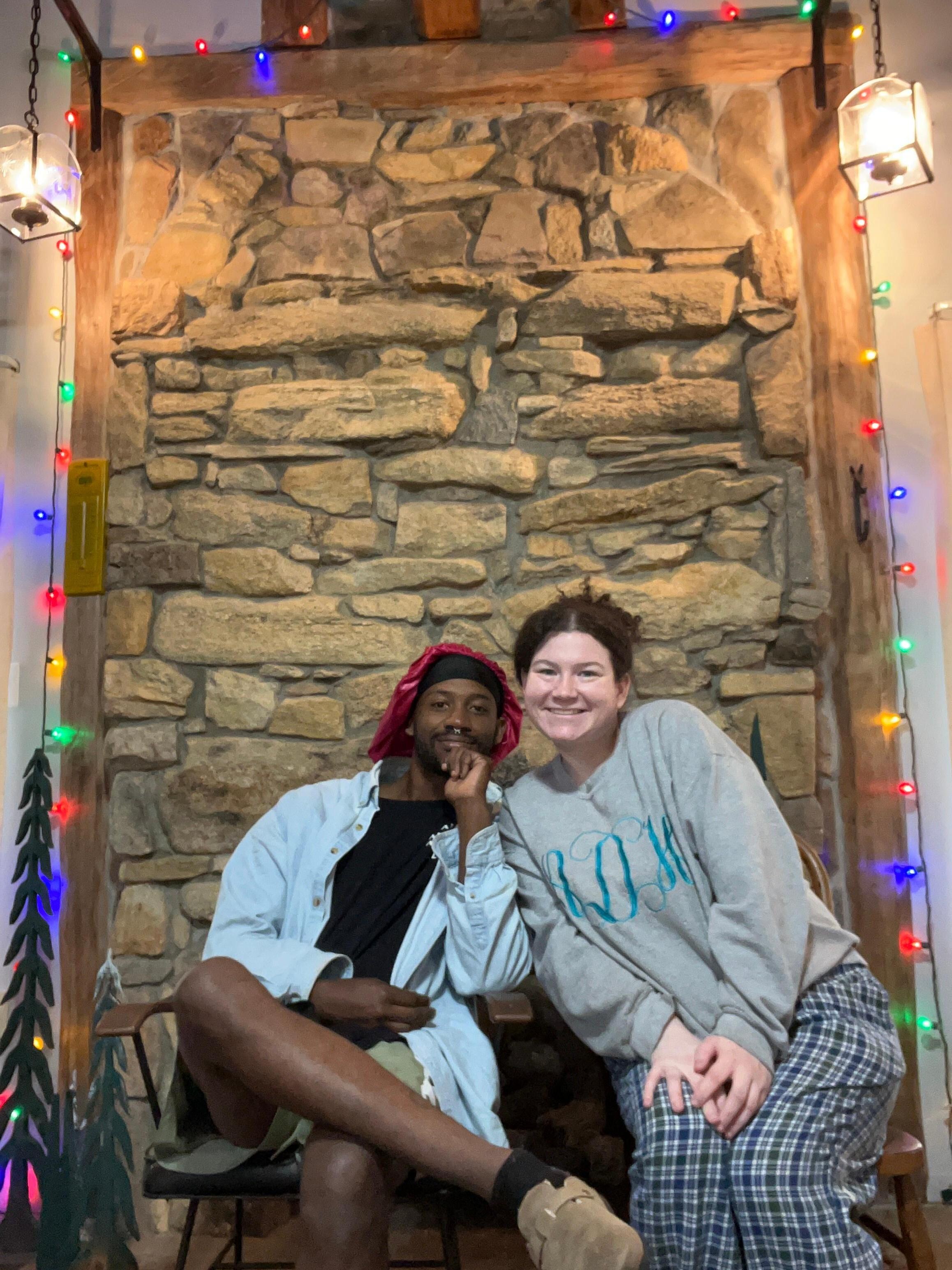 A cheesy picture of us by the fireplace :)