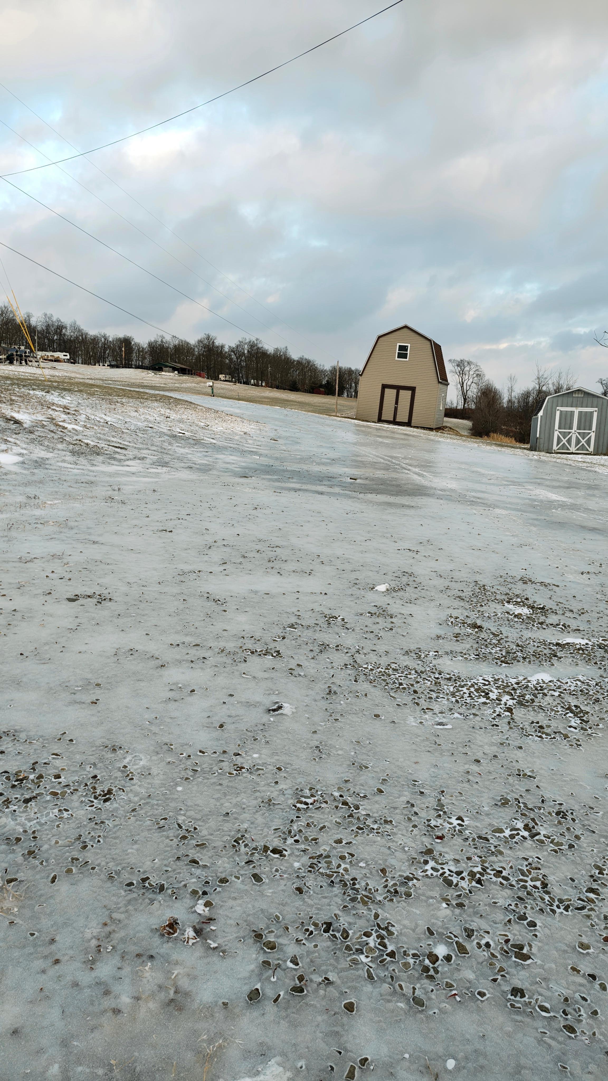 hilly driveway with black-ice