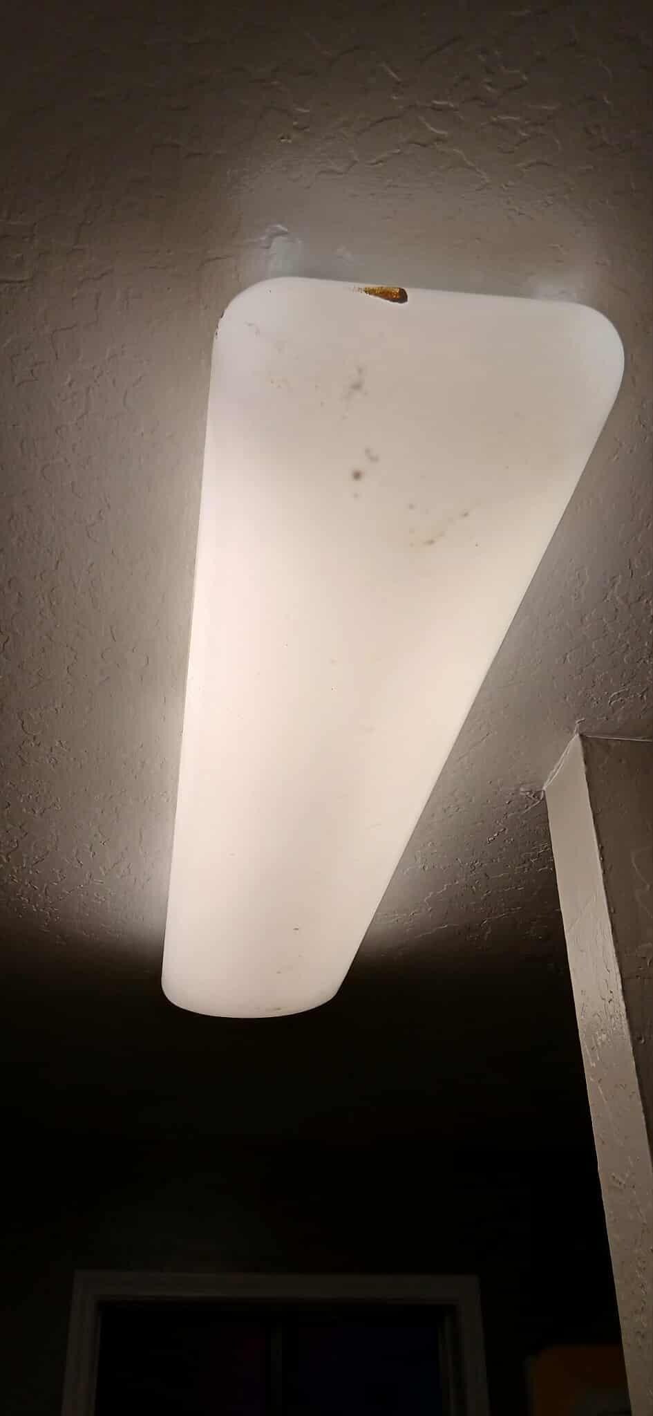 I finally got the bathroom light to work after about a half hour then noticed all the crud in the enclosure 