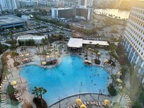 The view from our room and the pool/recreation area and bar.