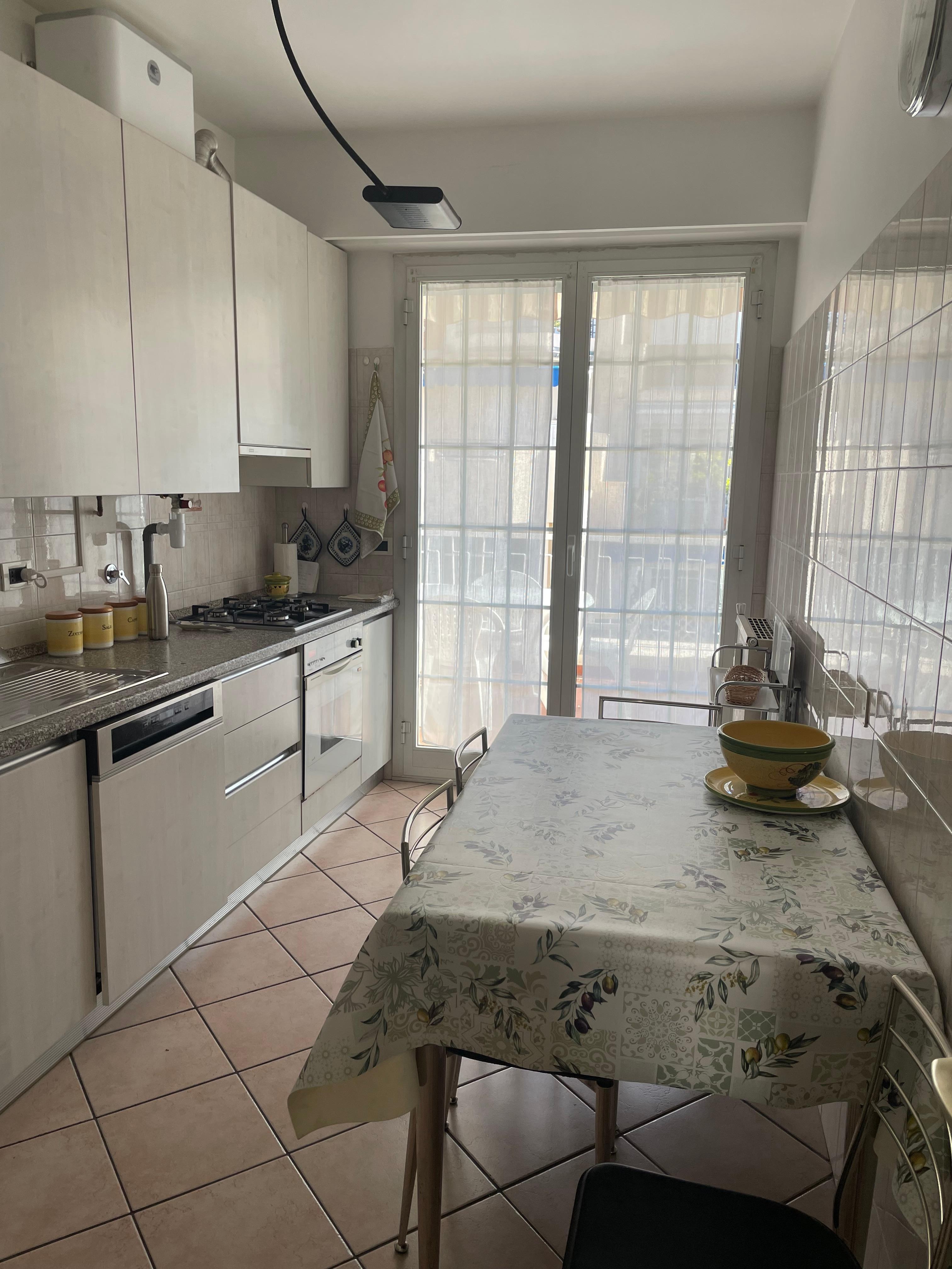 The kitchen with a large balcony