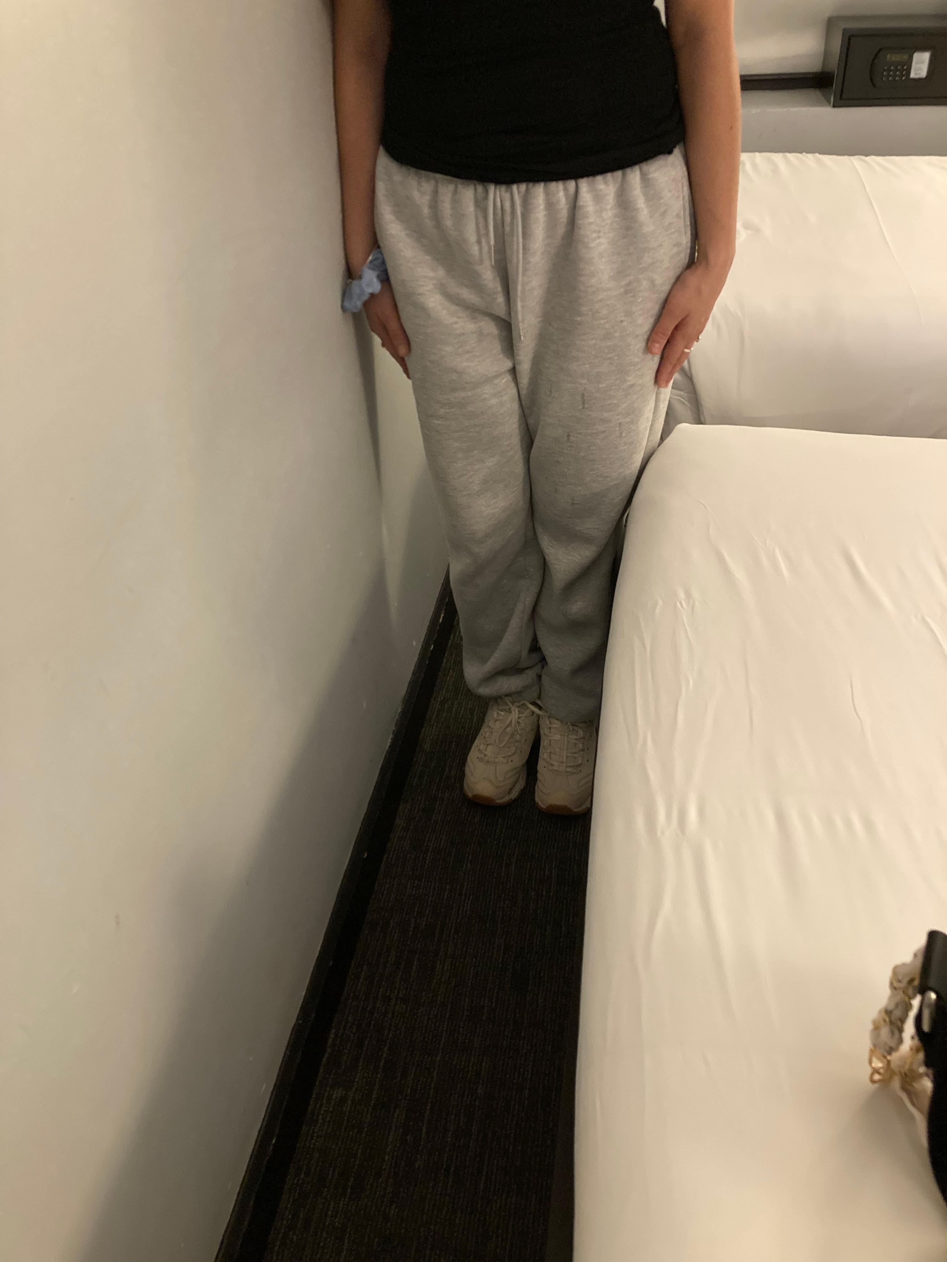 To pass thru - must avoid hitting head on tv above and knee on protruding frame below