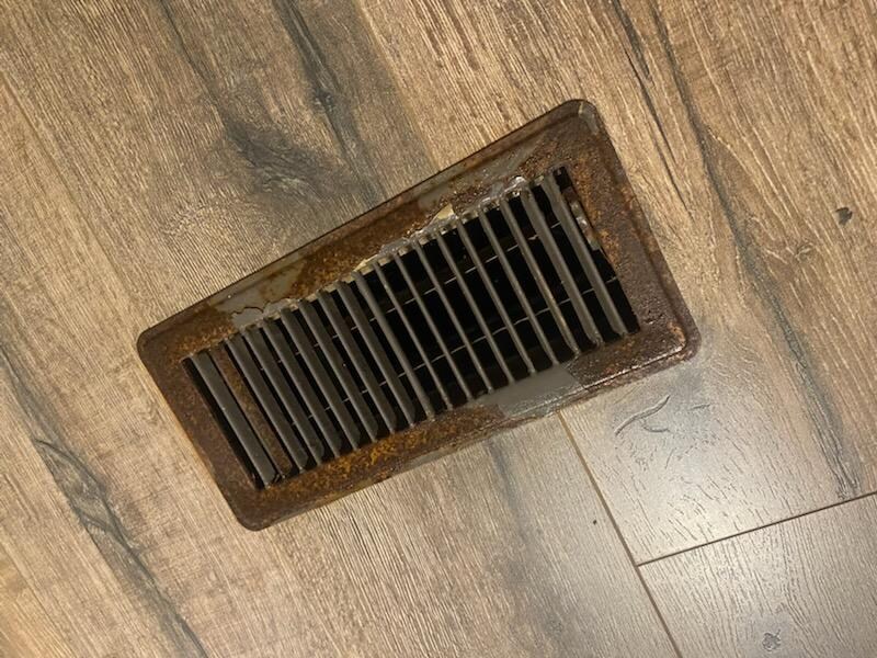 Rusty floor grill from all the cold condensation