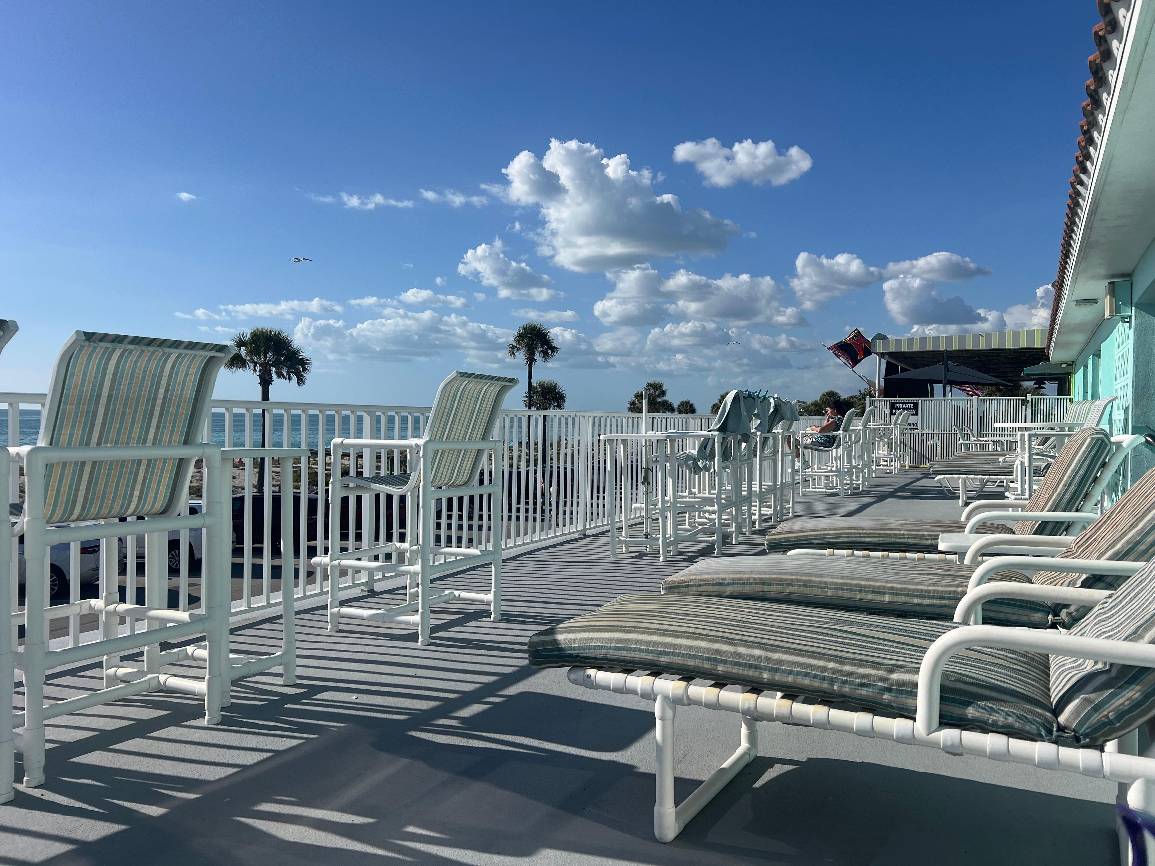 Nice large balcony w tables chairs & loungers 