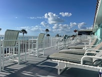 Nice large balcony w tables chairs & loungers