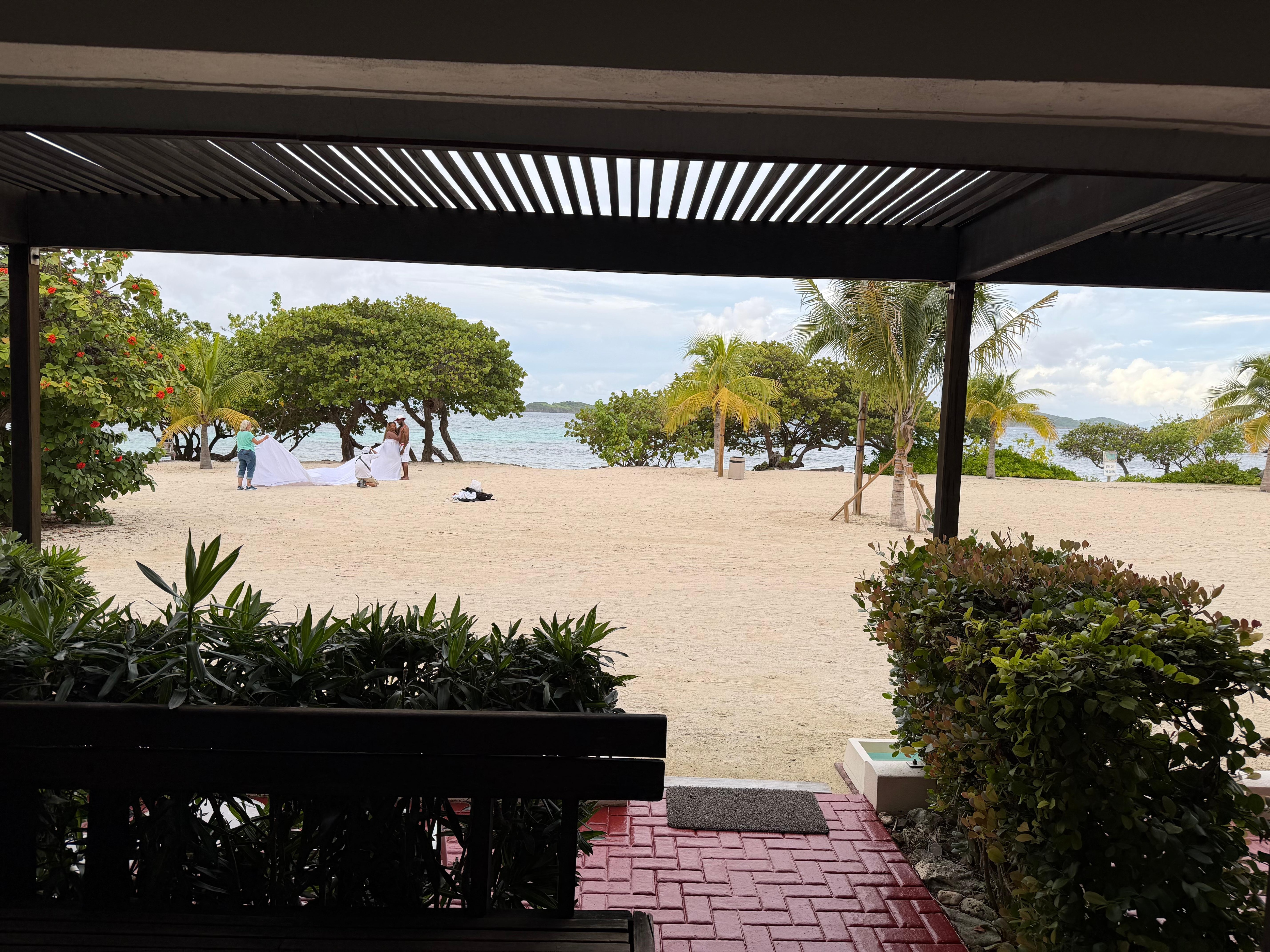 View from the patio of the condo looking at the beach and ocean.