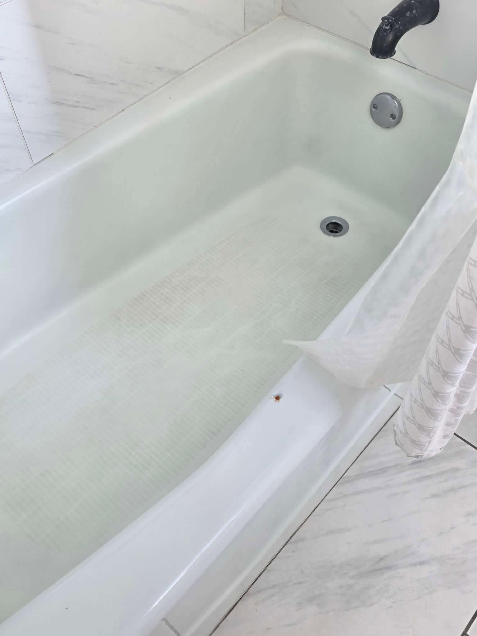 Rusty, stained, gross tub