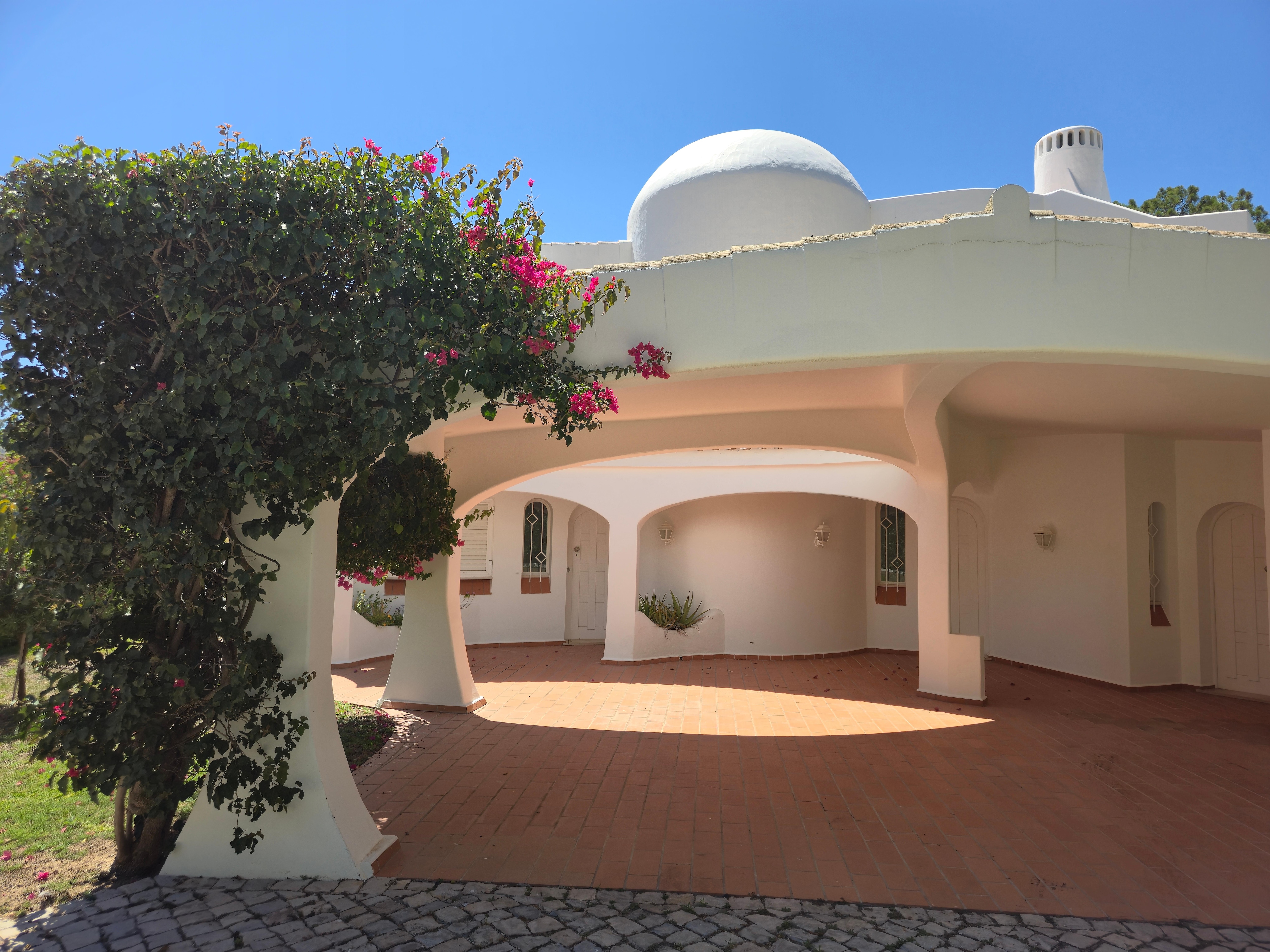 Shady car port and front door