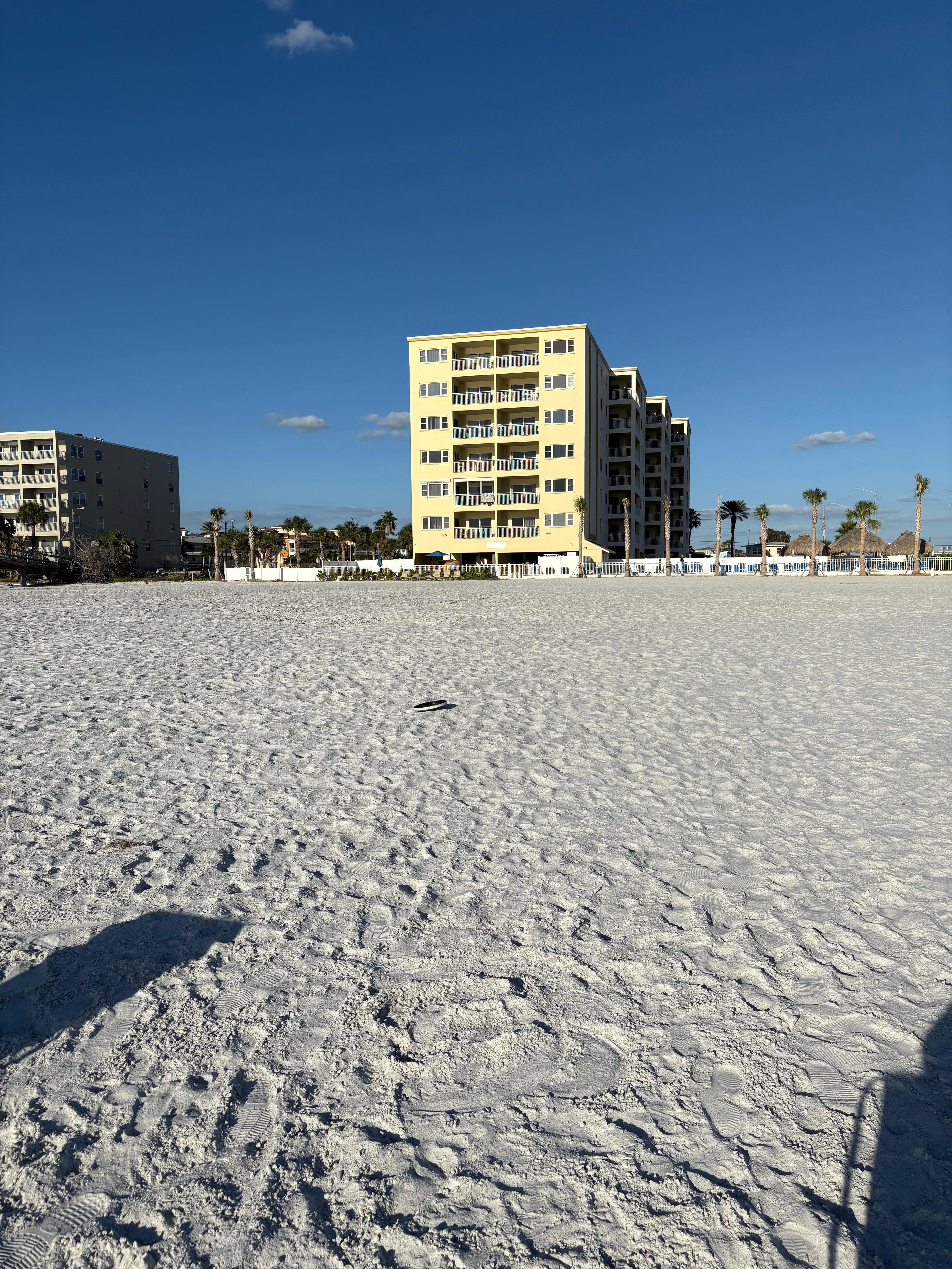The condo from the beach. Walk out into the sand. 