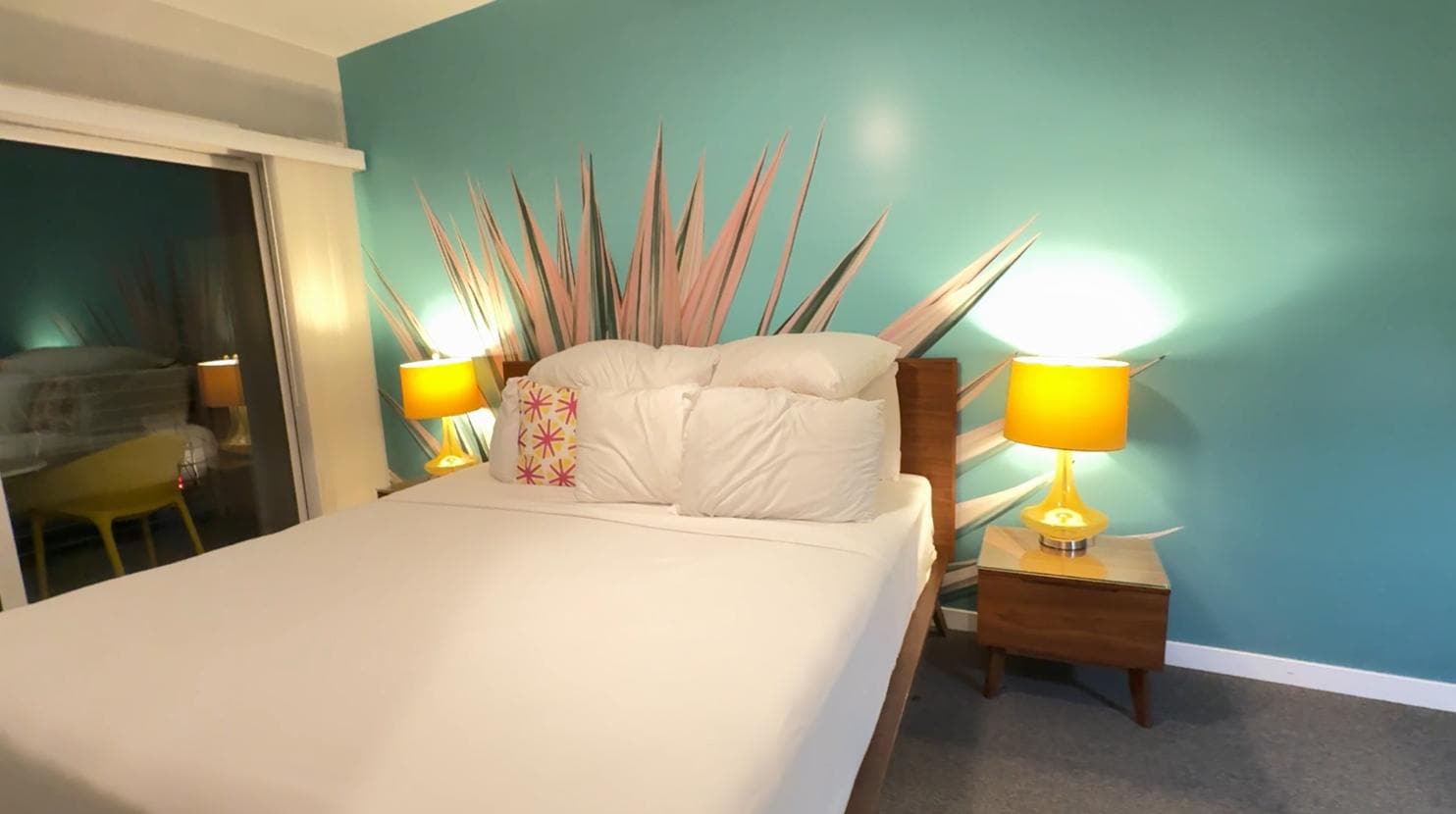 Bed with slider to back balcony.