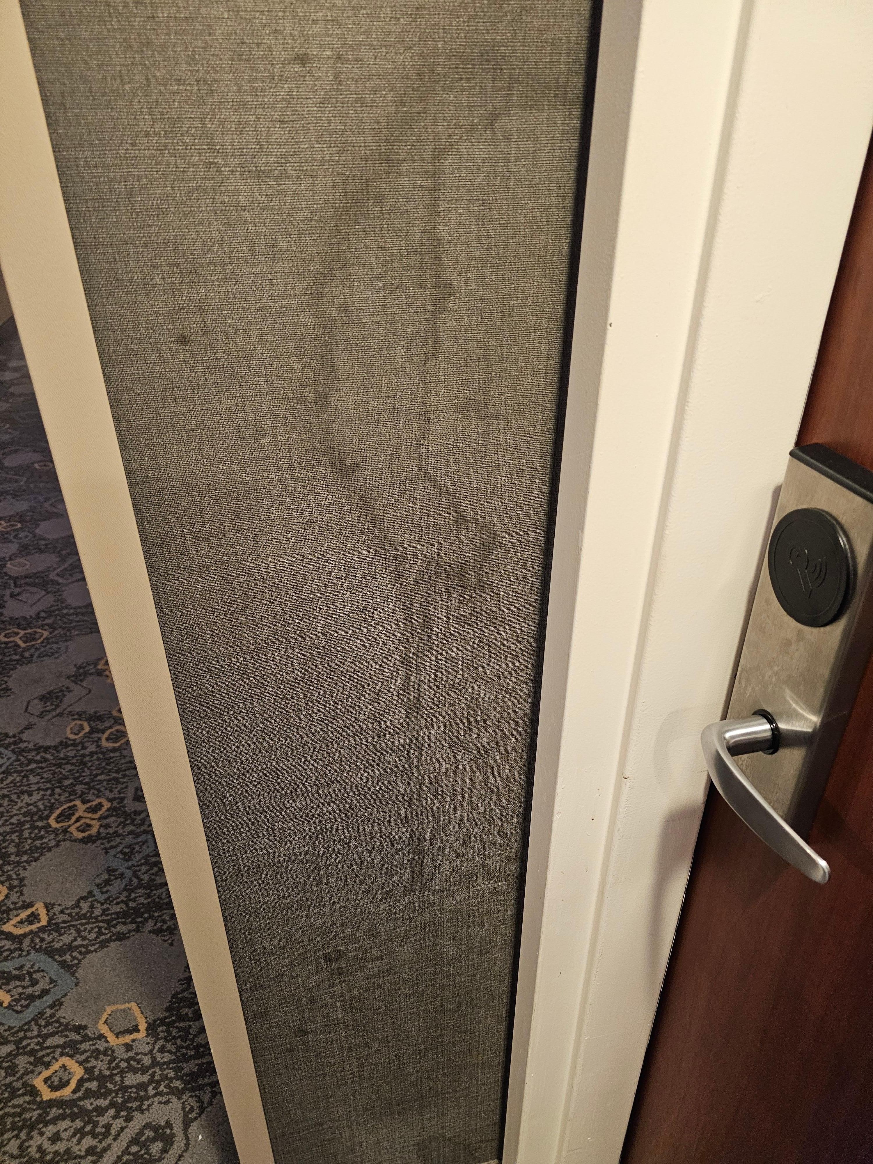 Wall in front of the door to the room