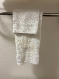 Dirty towels in bathroom