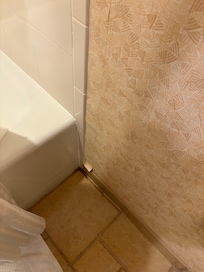 Even more peeling paper. Pic doesn’t do justice for wrinkles up side of tub under paper.