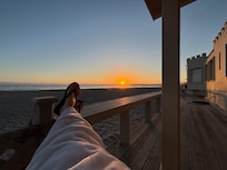Relaxing in the warmth of my favorite throw at sunset!