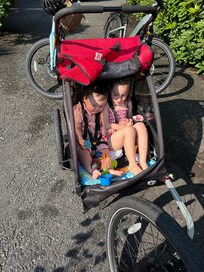 Emy and Leo loved being pulled on the bike trail.