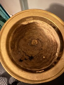 Chewed gum and ash in container