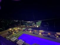 View of the pool from level 2 room at night