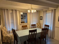 Dining Room with extra chairs around
