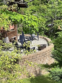 Fire pit area. The view is from the cabin side deck.