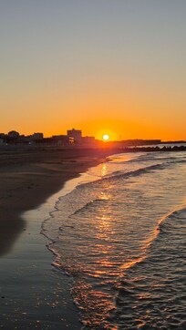 Sonnenaufgang am Strand. Blick in Richtung Carnon.