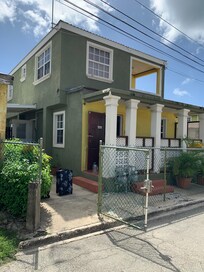 The photo of our unit is the upstairs of the property. However we were given the downstairs without previous notice. Also the location on the map showed property closer to the beach road.