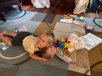 Our grandson with his little sister.