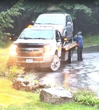 I flatbed tow truck can easily fit down the driveway when your vehicle blows a radiator.....
