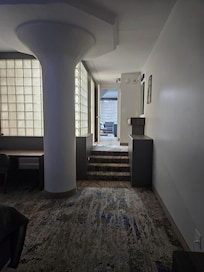 View from bedroom into outer area