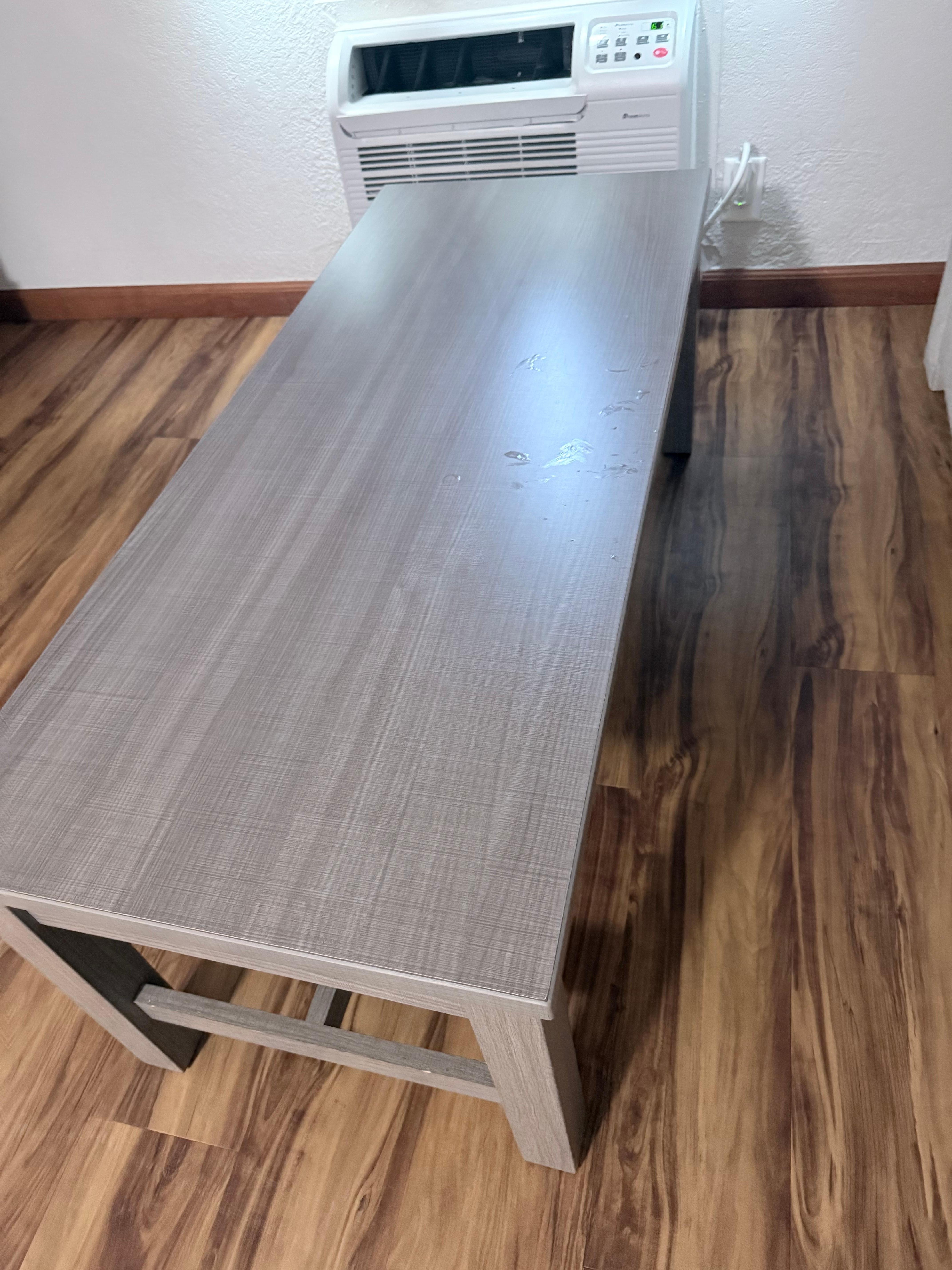 Table had greasy stains all over it. 