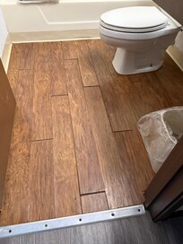 Laminate flooring buckling.